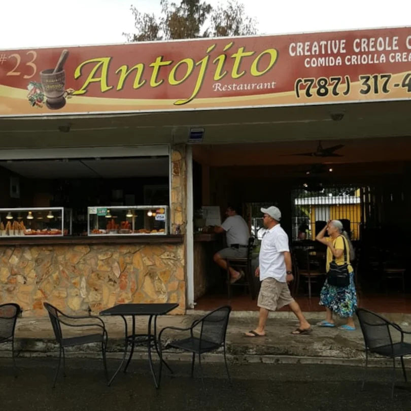The front of Antojito restaurant kiosk #23 offering creative creole cuisine.