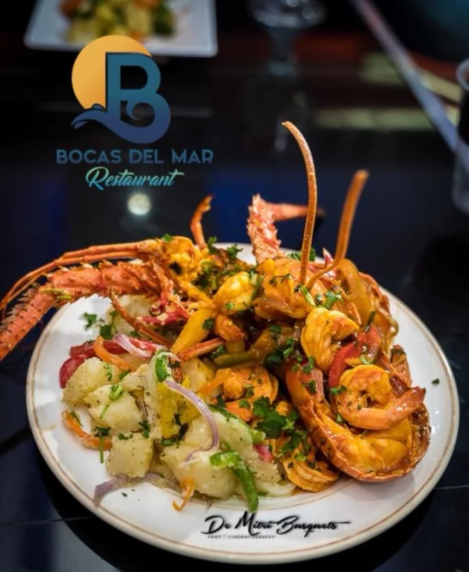 A large plate of seafood including lobster and shrimp available at Bocus Del Mar restuarant.