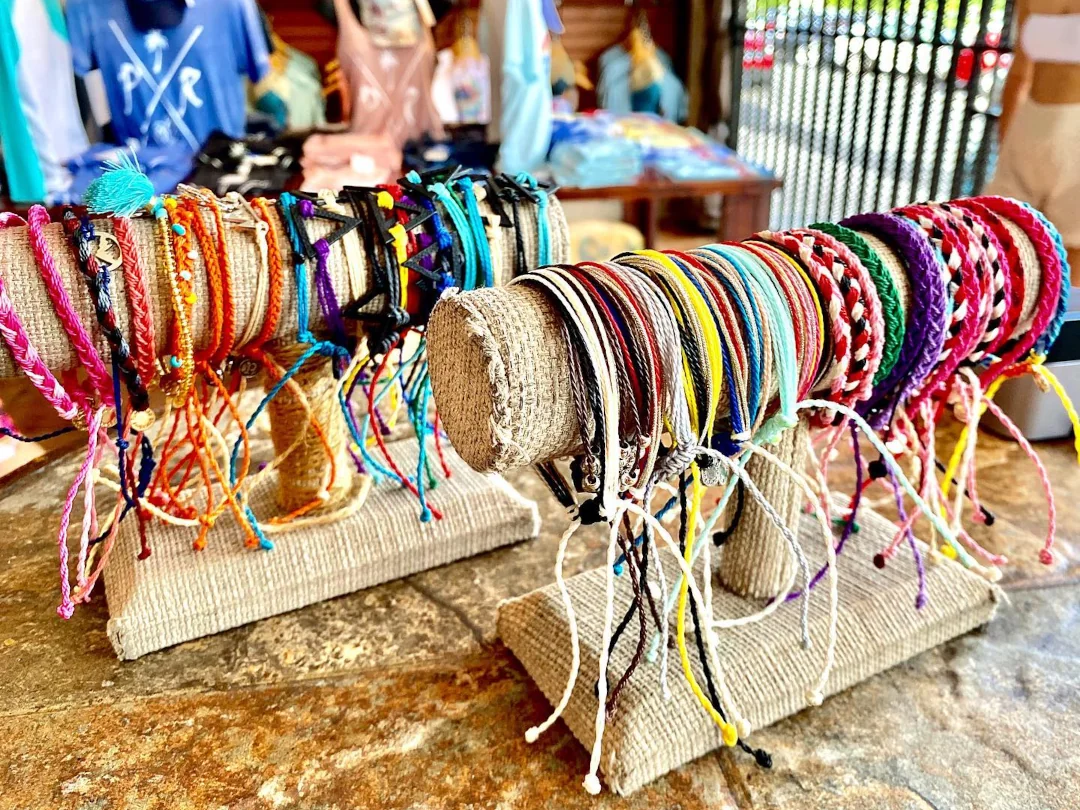 An assortment of locally made bracelets available at Monkey Threads.