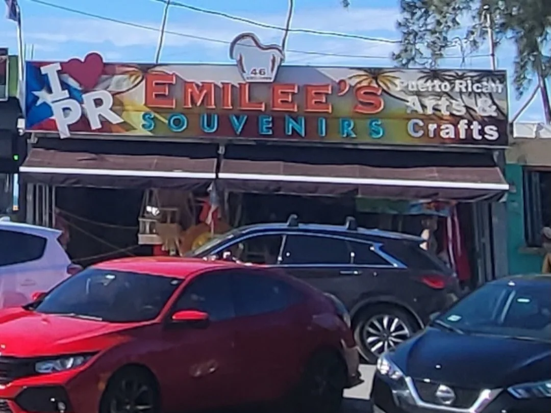 The front of Emilee's Souvenirs, kiosk #46 offering locally made art, clothing and souvenirs.