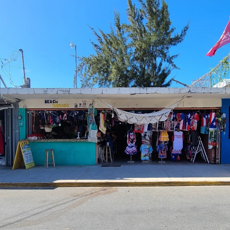 The front of Beach Banana Kiosk #47, selling clothing, beach accessories, and souvenirs.
