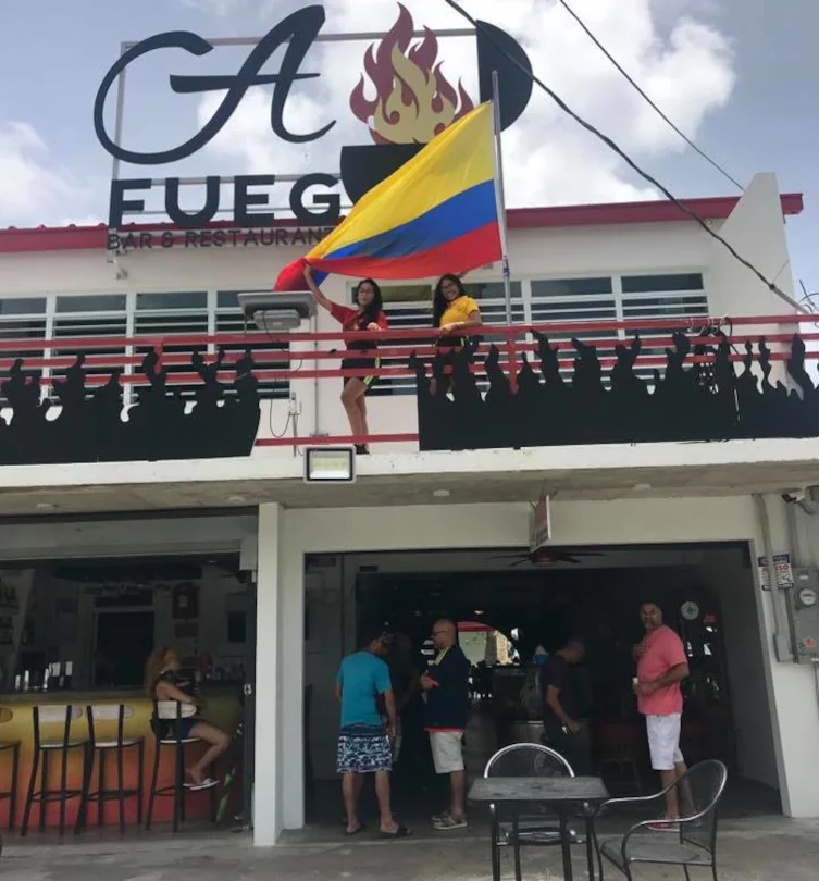 The front of A-Fuego Bar and Restaurant offering a blend of Puerto Rican and Columbian cuisine.