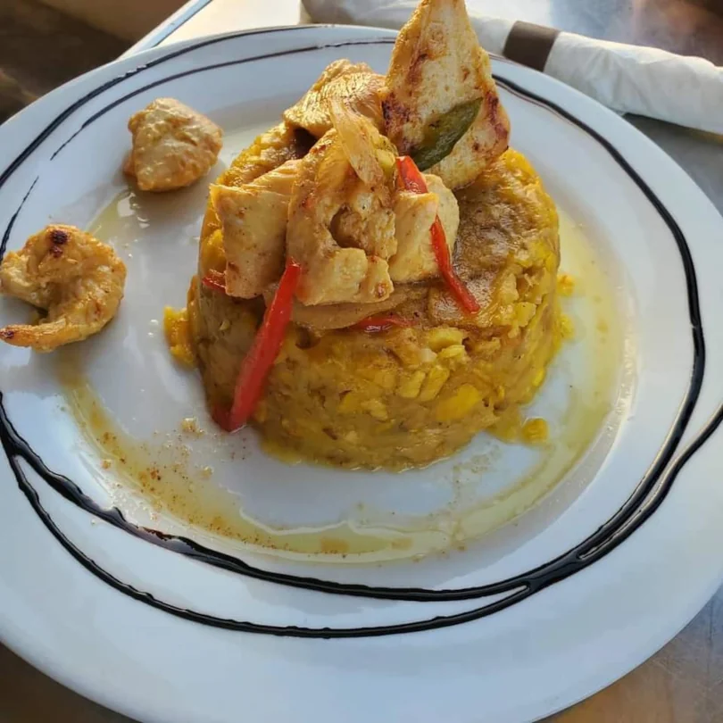 Mofongo with chicken and red peppers from A-Fuego Bar and Restaurant