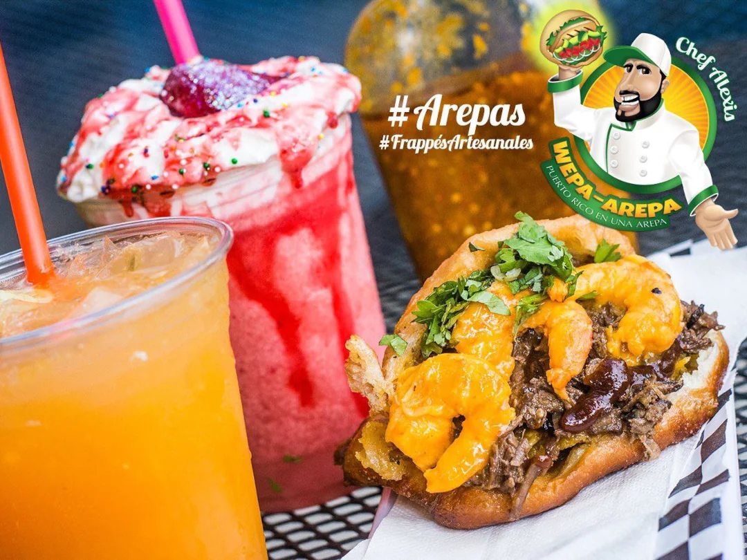 A beef arepa next to two frozen limonades, one has whipped cream and sprinkles on top from Wepa Arepa.